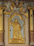 Autels latéraux. Autel latéral droit, porte de l'armoire eucharistique, bas-relief représentant saint Louis