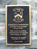 Plaque du site de la maison de Charles Campagna. Vue avant