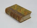 Livre (L'office de la Semaine sainte et de celle de Pâque [sic] : en latin et en françois selon le missel et bréviaire romain : au quel on a ajouté un exercice pour entendre la messe, l'explication des cérémonies, des réflexions, et les pseaumes de la pénitence). Extérieur de l'imprimé