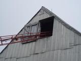 Grange-étable. Détail sur le mur pignon ouest. Vue latérale
