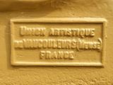 Site patrimonial du Calvaire-d'Huberdeau. Détail de la marque l'Union artistique internationale de
Vaucouleurs