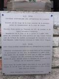 Sanctuaire de la Vierge-de-Lourdes. Plaque commémorative apposée lors du 150e anniversaire des apparitions de Lourdes et du 50e anniversaire du sanctuaire en 2008