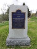 Plaque d'Étienne Corriveau. Vue générale