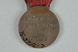 Médailles (Médailles des fêtes du Centenaire de la colonisation du Saguenay de 1938). Médaille avec ruban rouge , , Vue de détail, Vue arrière