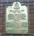 Plaque de John Henry Pope. Vue avant
