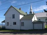 Presbytère Metis Beach United Church. Vue latérale