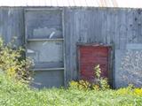 Grange-étable. Détail de porte sur mur gouttereau nord. Vue arrière