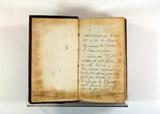 Livre (Cl. Claudiani quae extant Nic. Hensius, Dan f. recensuit ac notas additit). Notes manuscrites au début du livre