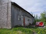 Grange-étable. Côté sud-est. Vue latérale