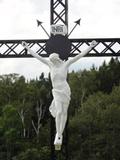 Croix de chemin. Détail de la statuaire. Vue avant