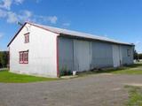 111, route du Fleuve. Ancienne grange transformée en hangar. Vue latérale