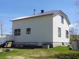 106, 2e Rang Est (avec garage). Vue arrière