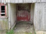 Grange. Détail de la porte cochère de la grange