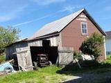 135, route Émile-Lachance (avec hangar et remise). Remise avec garage. Vue avant