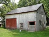 1335, rue Principale (avec hangar). Petite grange. Vue avant