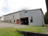Hangar, remise et atelier. Vue latérale