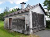 160, rue Saint-Joseph (avec garage et hangar). Garage. Vue d'ensemble