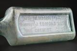 Bouteille d'apothicaire. Détail de l'inscription sur la face avant