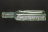Bouteille à médicament. Détail de l'inscription «VEGETABLE»