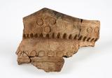 Collection d'objets du site archéologique Cartier-Roberval. Fragment d'un vase iroquoïen