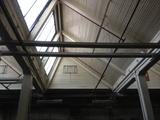 Complexe industriel de la Canadian Bronze Powder Works. Vue intérieure montrant une section du toit en shed de l'ancienne fonderie (2014).