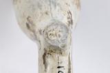Pipe. Détail de la marque sous le talon