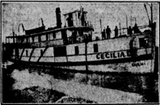 Épave du Cécilia L.. Navire à vapeur Cécilia L. photographié entre 1910 et 1912, entre Montréal et Valleyfield, Québec.