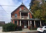 Site patrimonial du Quartier-du-Musée. Édifice situé sur la rue Notre-Dame-de-l'île à l'angle de la rue Papineau
