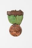 Médailles (Médailles des fêtes du Centenaire de la colonisation du Saguenay de 1938). Médaille avec ruban vert, Vue avant