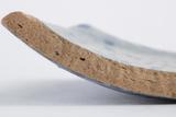 Fragment de pot ou de cruche. Détail de la pâte