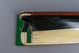 Demi-coque d’un voilier trois-mâts. Vue de détail