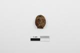Masquette ou fragment de figurine. Vue de face