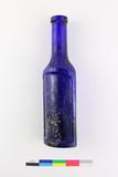 Bouteille de Laxol. Côté C