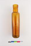 Bouteille à médicament. Côté