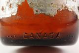 Bouteille à bière. Détail de l'inscription «CANADA»