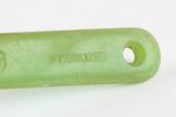 Brosse à dents. Détail de l'inscription «Sterilized»