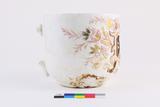 Tasse. Côté D