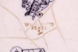 Plat de service. Détail de l'inscription estampée