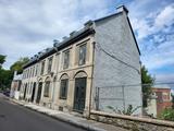 Maison Jean-Langevin. Vue d'angle des façades avant et droite.