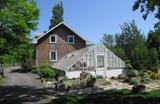 Domaine Joly-De Lotbinière. Maison du jardinier et sa serre