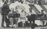 Pratique de l'accordéon diatonique à Montmagny. Marc Benoit (contrebasse), Raynald Ouellet (accordéon), Marcel Messervier (accordéon) et Marcel Messervier Jr (piano), lors de la première édition du Carrefour mondial de l'accordéon.
