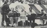 Pratique de l'accordéon diatonique à Montmagny. Marc Benoit (contrebasse), Raynald Ouellet (accordéon), Marcel Messervier (accordéon) et Marcel Messervier Jr (piano), lors de la première édition du Carrefour mondial de l'accordéon.