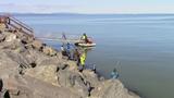 Pêcheurs d'éperlans au quai de Notre-Dame-du-Portage